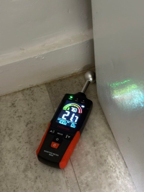 Laserline ball-probe meter against baseboard